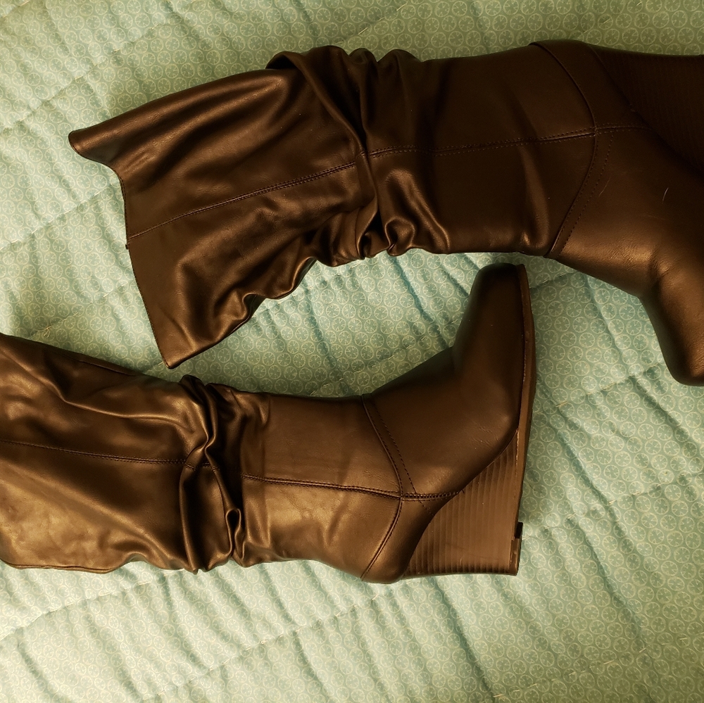 Knee high heeled boots